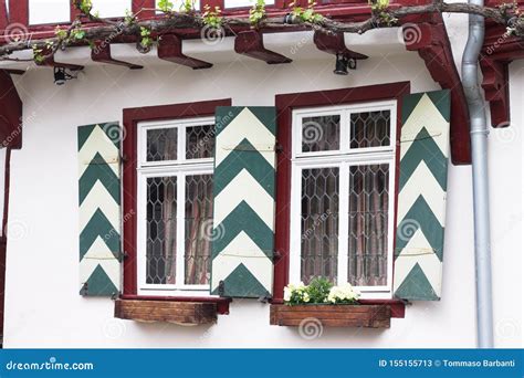 german houses with metal shutters to keep sun out|german shutters vs german windows.